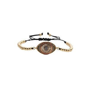 Adjustable evil eye charm bracelet with gold beads and colorful zircon stones on white background