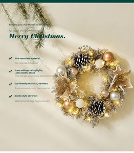 Detail of 40cm silver Christmas wreath with pine cones, LED lights and festive ornaments