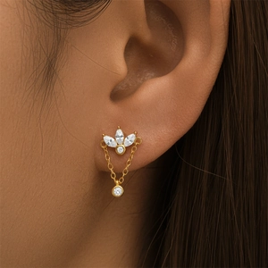 Detailed view of S925 silver crown cartilage earring with marquise diamond and gold chain