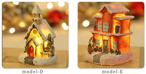 Detail of Model D and E lighted Christmas snow house resin ornaments with festive LED glow