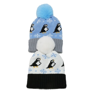 Winter penguin knitted beanie with fleece lining and fluffy pompom for outdoor warmth