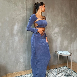 Detailed view of sexy blue two-piece set featuring cutout long sleeve top and long skirt