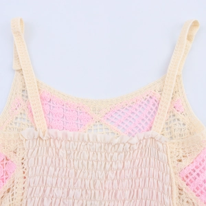 Sweet apricot crochet camisole with pink hollow knit details and ruffled smocked texture