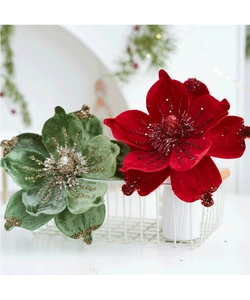 Close-up of velvet Christmas magnolia flowers with glitter petals in a white basket