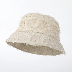 Beige wide-brim distressed bucket hat for women with textured frayed edge and square jacquard