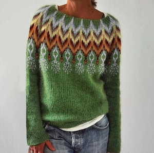 Detail of green knit sweater neckline with geometric wave patterns and mohair texture