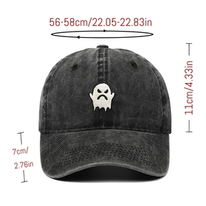 Detail view of washed denim baseball cap with ghost embroidery and sizing specifications