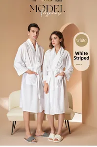 Close-up of white striped absorbent bathrobe with long sleeves and large side pockets