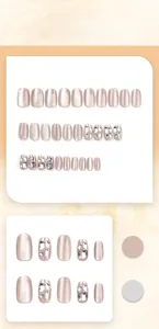 Detailed view of champagne cat-eye press-on nails with glitter and crystal rhinestones