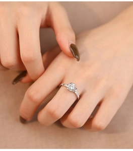 Macro shot of S925 sterling silver rose ring with pavé zircon and adjustable open band