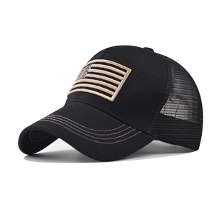 Classic black trucker hat with US flag embroidery and breathable mesh backing