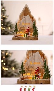 Macro detail of glowing wooden X-mas scene featuring Santa Claus and reindeer carvings