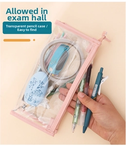Detailed view of pink fabric edge trim on transparent PVC zipper stationery pouch