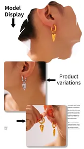 Model display of heart drop earrings in 18k gold and silver finish on ears