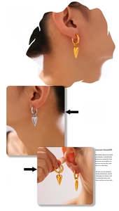 Model display of heart drop earrings in 18k gold and silver finish on ears