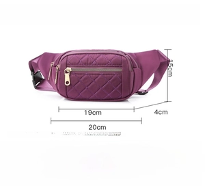 Detailed view of purple quilted nylon waist bag with size dimensions and multi-zipper pockets