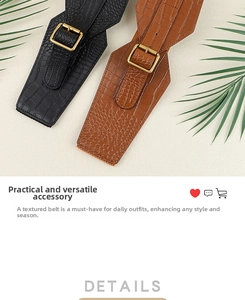 Close-up of wide crocodile pattern belts in black and brown with golden buckles
