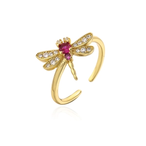 Gold-plated dragonfly open ring with red and white sparkling zircon stones on white background