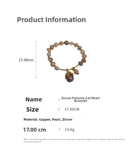 Detailed view of freshwater pearl bracelet with zircon lucky cat charm and copper beads
