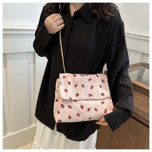 Chic pink corduroy strawberry crossbody bag with gold chain strap for women