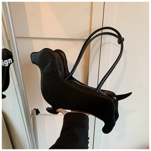 Detail view of the black dachshund shaped tote bag featuring metal zipper and PU leather