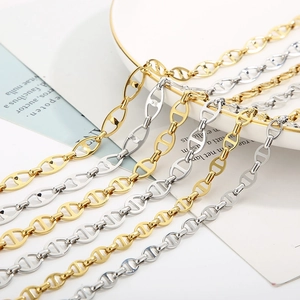Gold and silver stainless steel pig nose anchor necklaces in a minimalist style