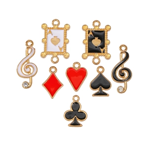 Detailed set of 8 gold-framed enamel playing card charms with sparkling rhinestones
