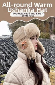 Detail of beige winter trapper hat featuring faux rabbit fur lining and leather patch
