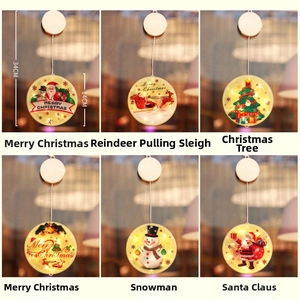 Detail of 6 LED Christmas suction cup window lights featuring Santa and reindeer designs