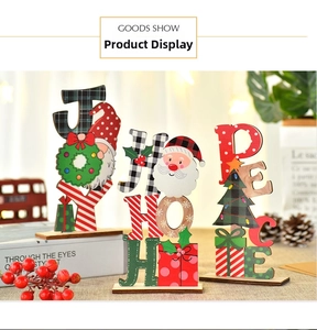 Detail of JOY HOPE PEACE wooden Christmas signs with gnome and festive patterns