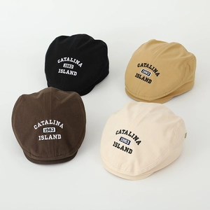 Close-up of four colors of cotton beret caps with Catalina 1983 3D embroidery detail