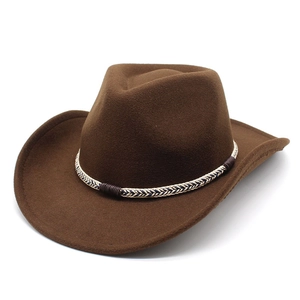 Detailed view of a dark brown felt cowboy hat with a braided band and leather strap
