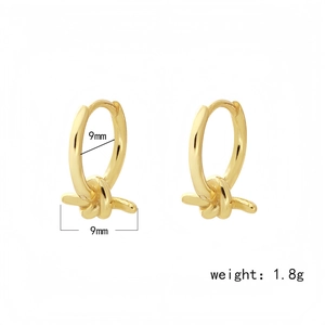 925 silver knot earrings in gold finish with 9mm diameter and minimalist knotted design