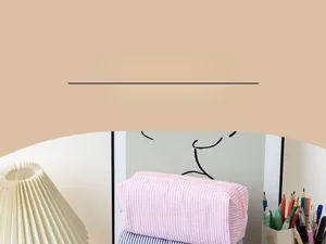 Detail of seersucker pencil case with pink and white stripes and secure zipper closure