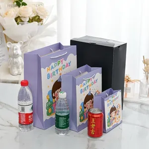 Three sizes of purple cartoon birthday gift bags with Happy Birthday text and rope handles