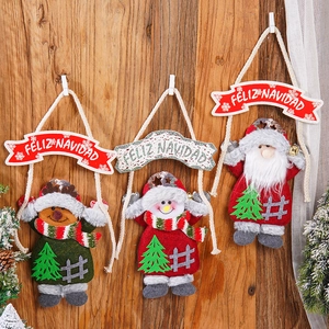 Three-piece cartoon Christmas tree ornaments with Feliz Navidad banner on wood background