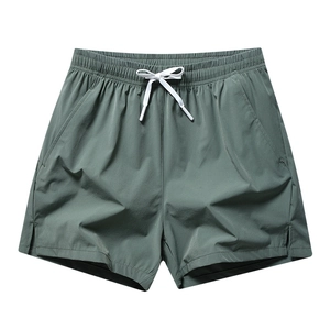 Men's olive green quick-dry sports shorts with elastic drawstring waist and side slits