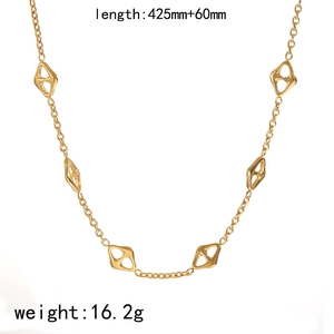 Detail of 18k gold plated stainless steel necklace with geometric rhombus charms