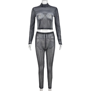 Mesh long sleeve crop top and high waist leggings set with abstract line pattern
