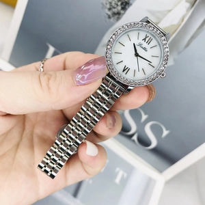 Silver ladies metal chain watch with rhinestone bezel and white roman numeral dial