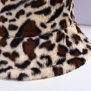 Close-up of leopard print faux fur texture on a thick winter bucket hat detail