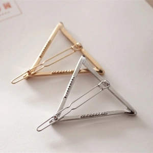 Minimalist geometric triangle hair clips in gold and silver metal finishes for women