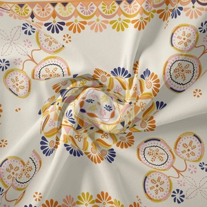 Detail of bohemian tapestry fabric with intricate orange and blue floral mandala pattern
