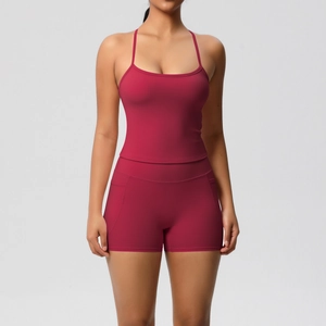 Detail of burgundy high-waisted yoga shorts featuring a functional side pocket