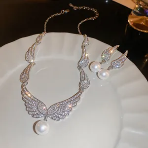 Elegant angel wings jewelry set with sparkling zircon necklace and pearl earrings for women