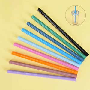 Macro detail of reusable 1cm wide Tritan straws in assorted vibrant candy colors