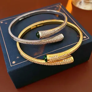 Luxury gold and silver plated open bangles with green emerald stones and micro-pave zircons