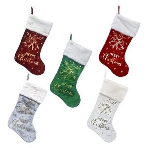 Set of 5 plush Christmas stockings with gold Merry Christmas lettering on white background