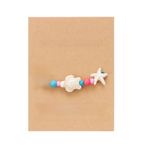 Bohemian seashell and starfish beaded wish bracelet with adjustable cord on gift card