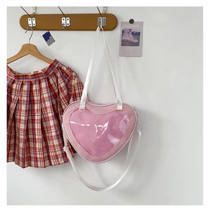 Pink heart-shaped ita bag with clear window and white strap in Japanese JK style detail